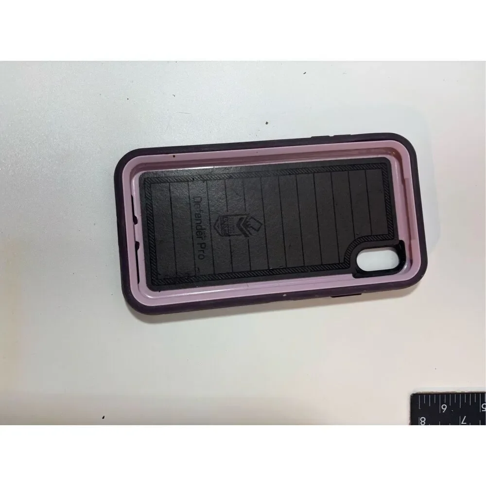 OtterBox Defender Pro case in purple with light pink accents. Designed for iPhon